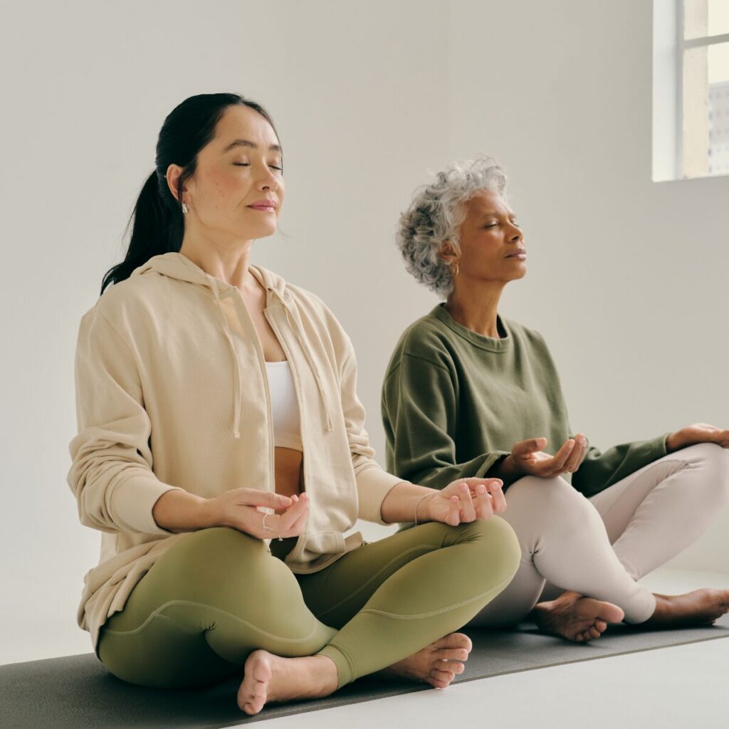 Women meditating.