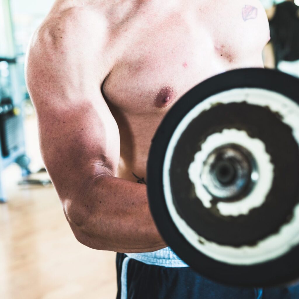 Man working out with a dumbbell.