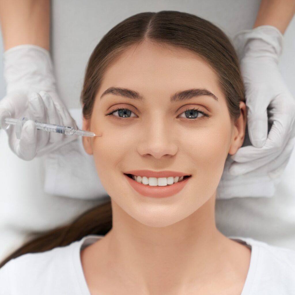 Woman being injected in her face.