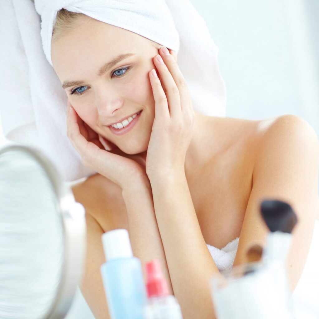 Woman looking at the mirror.