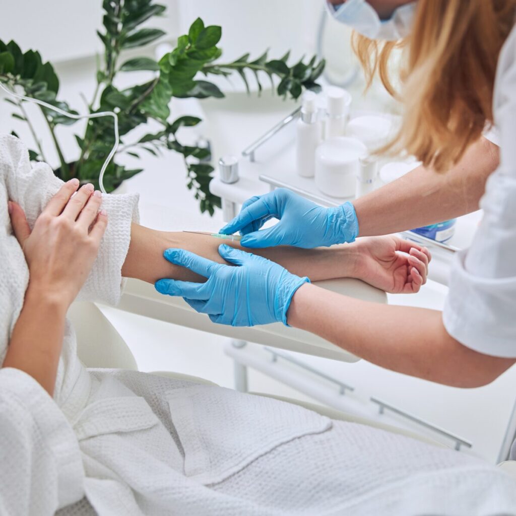 Person getting an IV treatment.