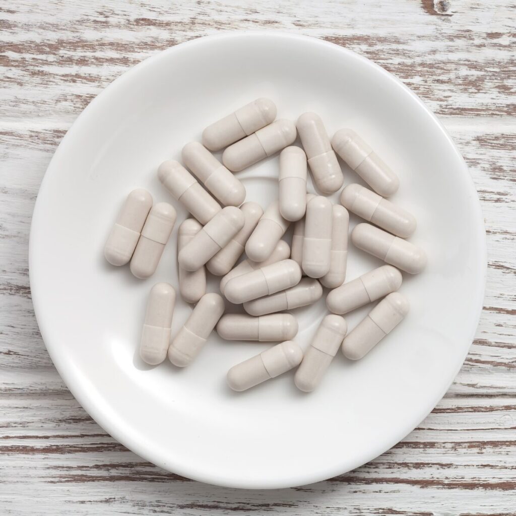 Glutatahione pills on a plate.