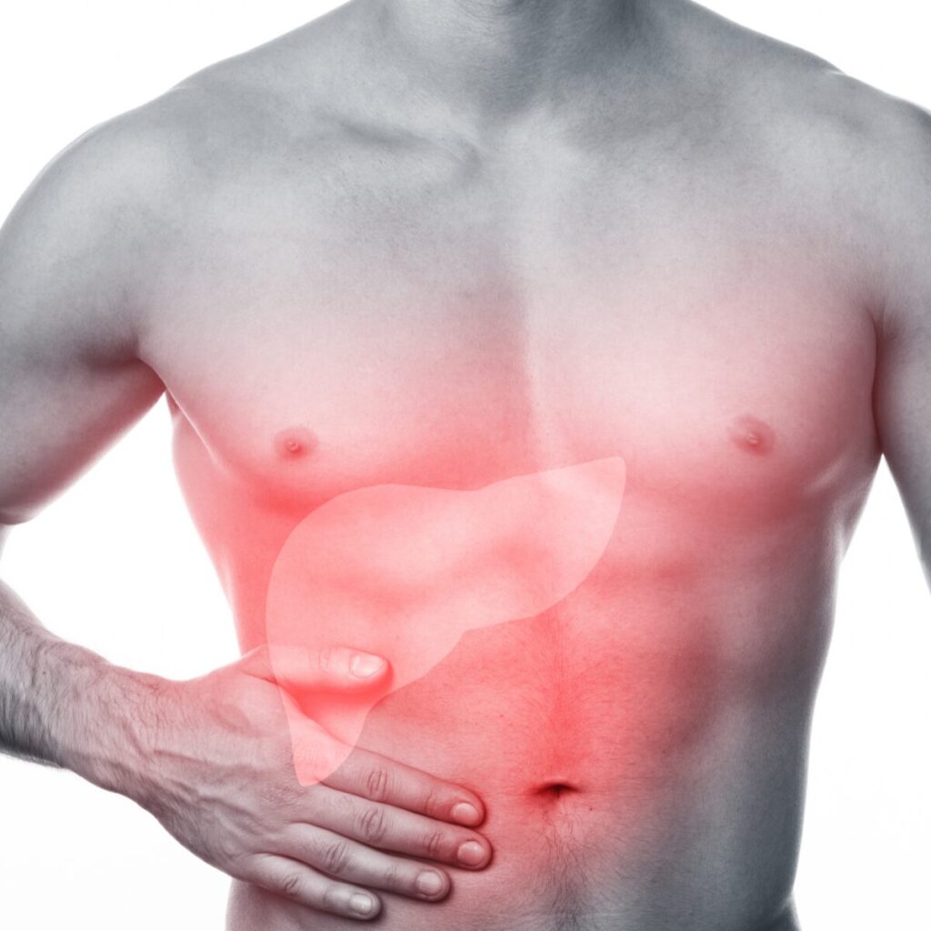 Man touching his stomach showing illustration of liver.