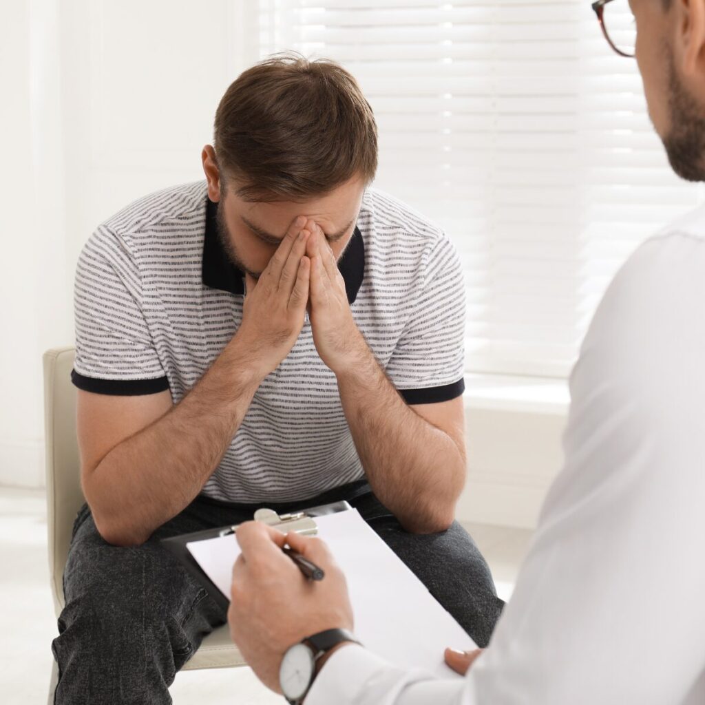 Man talking to therapist.