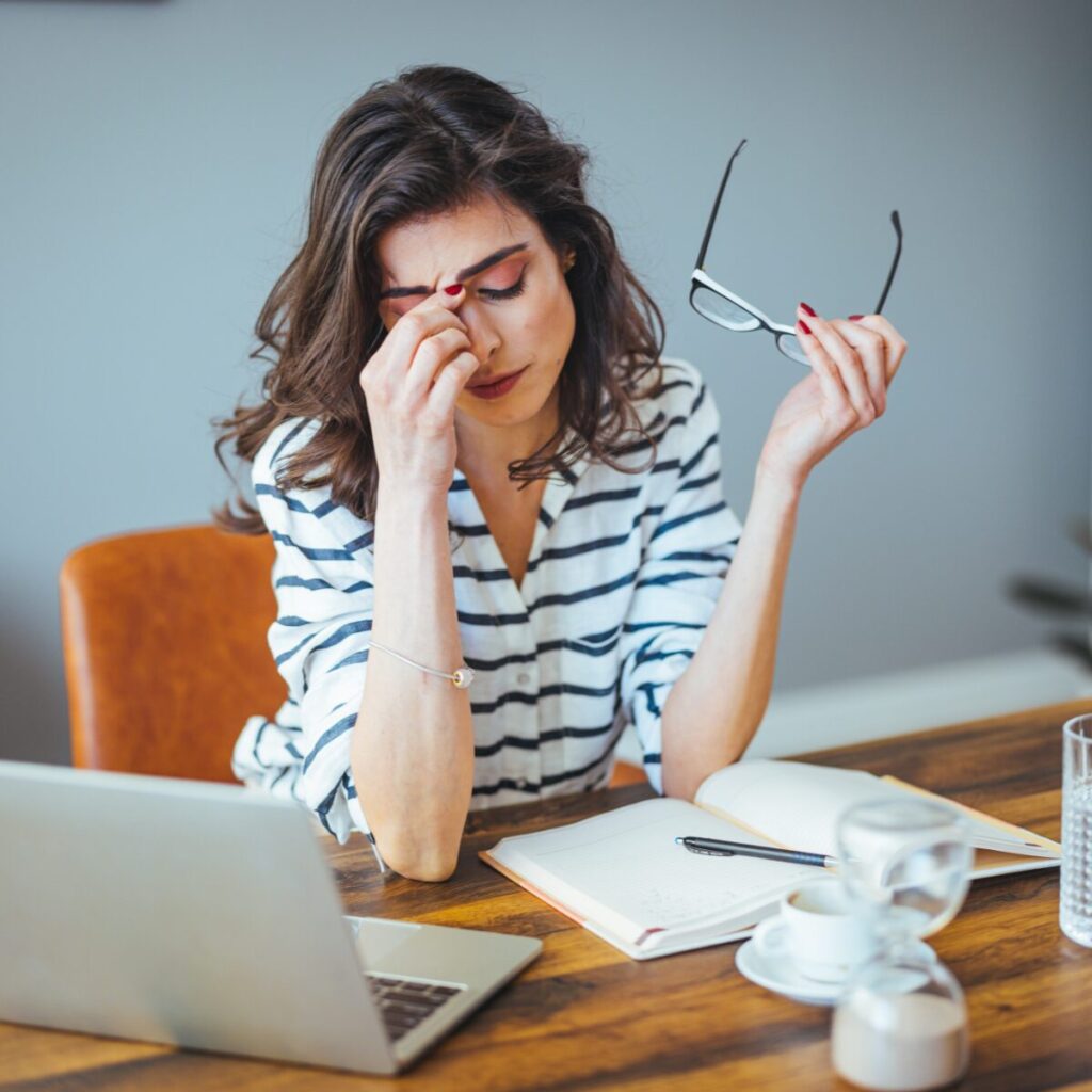 Woman stressed about work.
