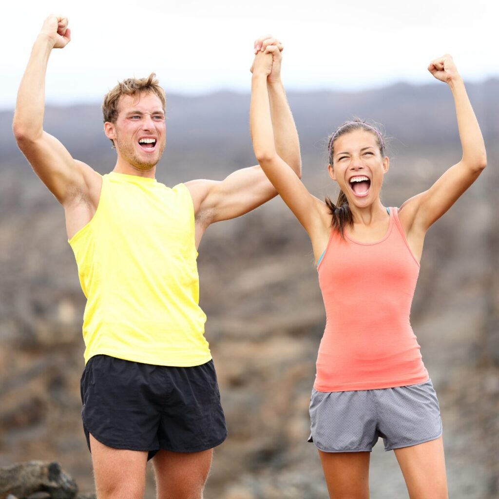 Happy and energetic couple celebrating.